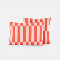 Coussins dans les tons rose et ocre