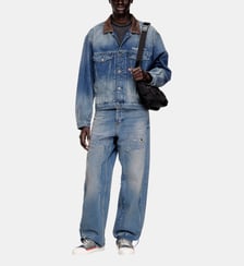 Veste en denim de type trucker avec garnitures en cuir contrastant. Diesel