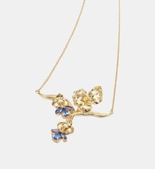 Collier plastron iris doré et cristal bleu Les Néréides