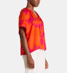 Top ample en satin à imprimé floral manches courtes La Fée Maraboutée