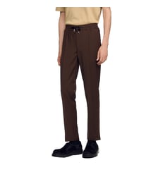 Pantalon élastiqué en laine Sandro
