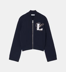 Pull zippé maille torsadée intarsia broderie Lacoste