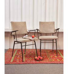 Paire de fauteuils en skaï Jakob N°1303- Produit chiné Debongout