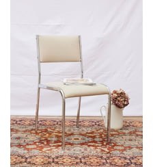 Chaise en skai et chrome Alma N°1725- Produit chiné Debongout