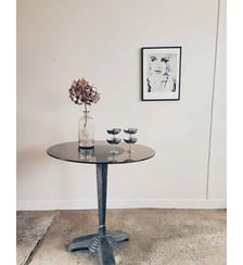 Table bistrot estampillée Vuitton Denise N°110- Produit chiné Debongout