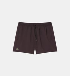 Short de bain mi-long uni Lacoste