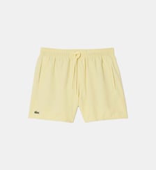Short de bain mi-long uni Lacoste