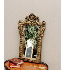 Miroir sculpté au cadre doré et sculptural Georges N°1275- Produit chiné Debongout