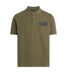 Polo en coton avec étiquette Balmain Vintage en cuir Balmain