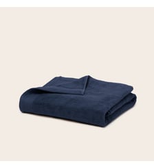 Serviette de toilette AKEMI  Tissu éponge en coton à finition gaufrée Madura