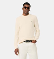 Pull coton uni col rond Lacoste