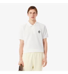 Polo classic fit Piqué badge Lacoste