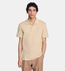 Polo en coton à logo cuir Sandro