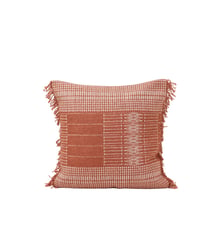 housse de coussin  Tissage naturel frangé rebrodé d’un motif graphique  Madura