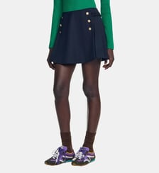 Jupe short à boutons en laine Sandro