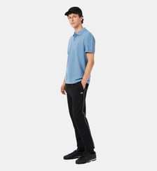 Pantalon de survêtement bandes griffées Lacoste