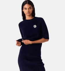 Pull avec broche florale Maje