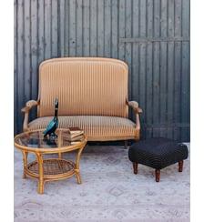 Pouf retapissé en tissu noir à motifs Jean-Philippe N°100- Produit chiné Debongout