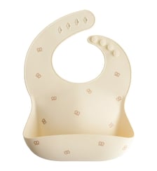 Bavoir à poche en silicone Mushie