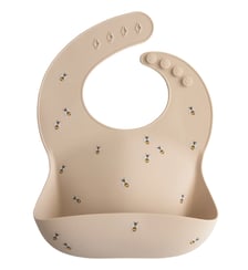 Bavoir à poche en silicone Mushie
