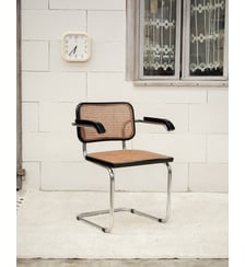 Chaise en osier et pieds chromés Alma N°1976- Produit chiné Debongout