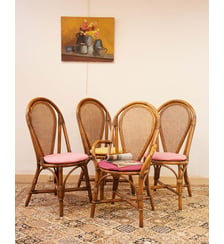 Lot de 3 chaises et 1 fauteuil en rotin Claude N°1584- Produit chiné Debongout