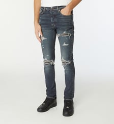 Jean slim déchiré empiècements coton stretch Amiri