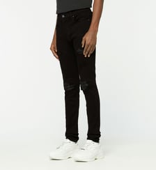 Jean slim déchiré empiècements coton stretch Amiri