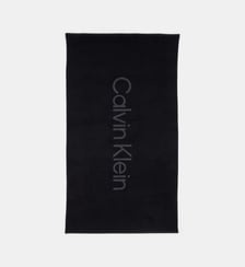 Serviette de plage unie en coton bouclette Calvin Klein