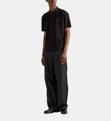 Polo droit signature en coton Prada