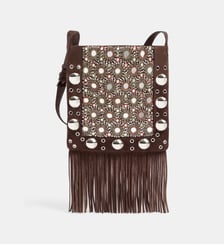 Sac à main forme pochette détails franges Valentino Garavani