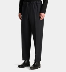 Pantalon à pinces fuselé court en laine Jil Sander