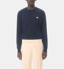 Pull ajusté en laine signature Valentino Garavani