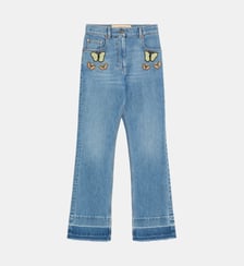 Pantalon en denim à broderies papillon  Valentino Garavani