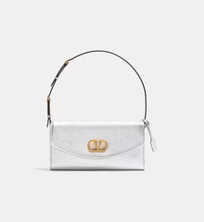 Sac pochette signature effet métallisé Valentino Garavani