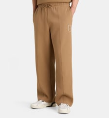 Pantalon jogging large coton piqué nouveau logo Badge Lacoste
