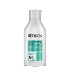 Shampoing réparateur pour cheveux bouclés abimés Redken
