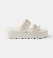 Mules à plateforme en cuir nappa matelassé Prada