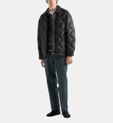 Manteau matelassé en tissu technique Prada
