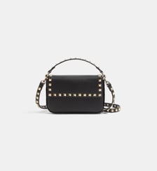 Sac pochette Rockstud en cuir de veau grainé Valentino Garavani