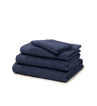 Serviette de toilette AKEMI  Tissu éponge en coton à finition gaufrée Madura
