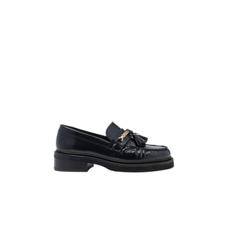 Mocassins en cuir à bords plissés Maje