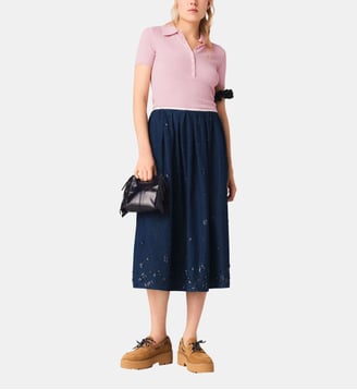 Jupe mi-longue en denim brodé Maje