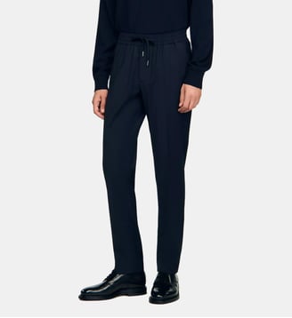 Pantalon élastiqué en laine Sandro