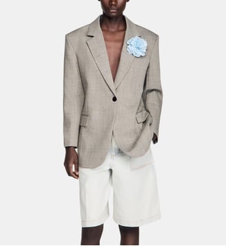 Veste en laine à carreaux et broche - Sandro - Greige