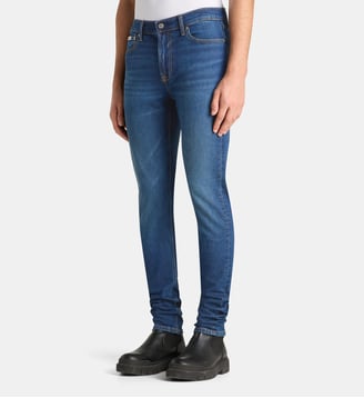 Jean tapered slim en denim délavé - Calvin Klein - Bleu denim