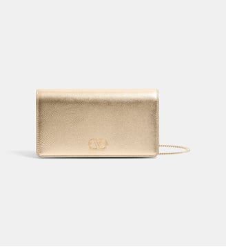 Mini sac pochette Signature en cuir - Valentino Garavani - Doré