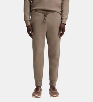 Jogging droit en coton stretch à logo en relief - BOSS - Marron clair
