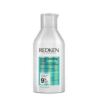 Shampoing réparateur pour cheveux bouclés abimés - Redken