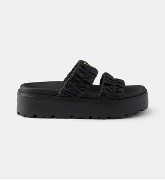 Mules à plateforme en cuir nappa matelassé - Prada - Noir